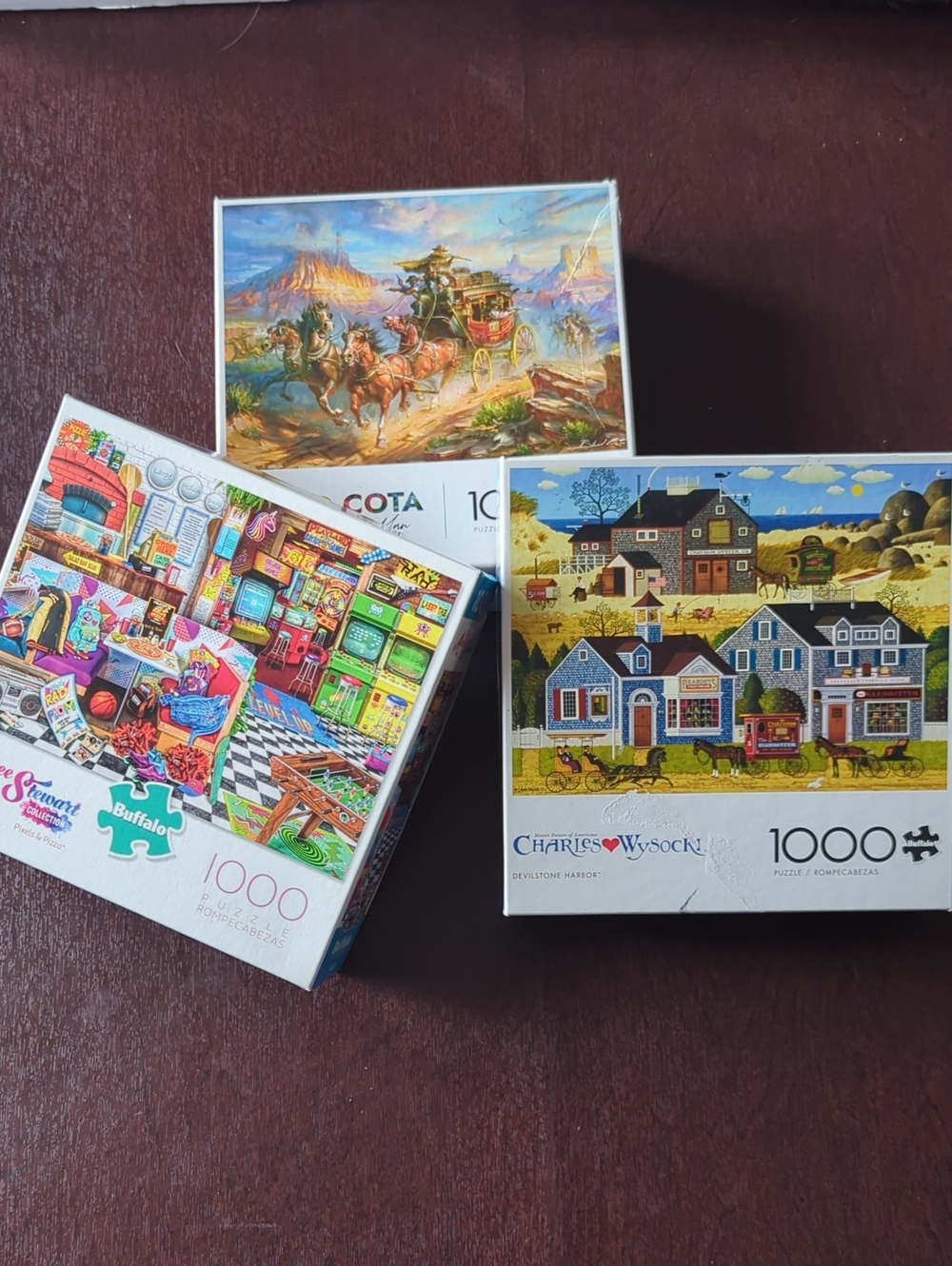 (3) Buffalo Games and Puzzles 1000pc Puzzles. See pictures